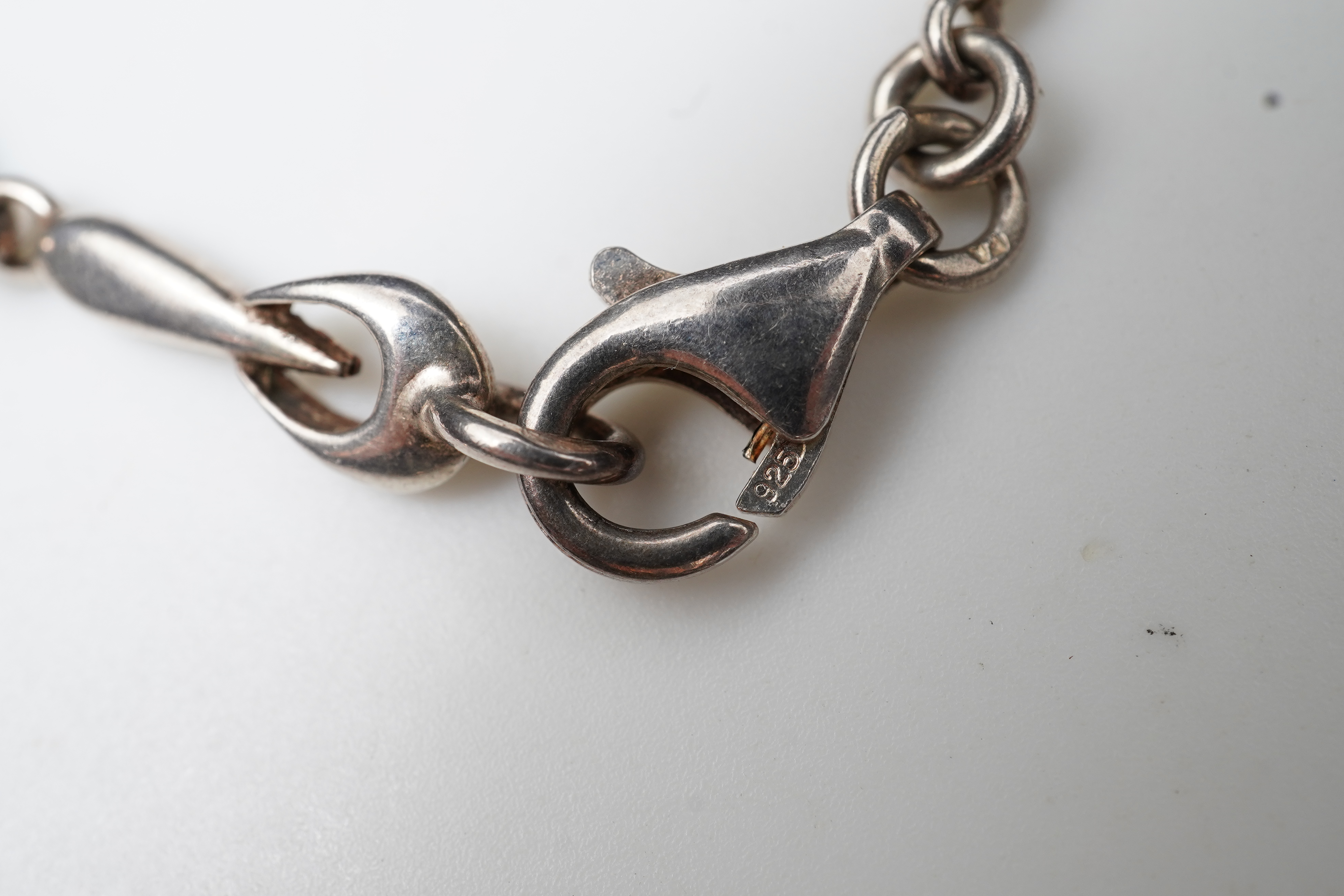 Bent Knudsen, a modernist silver necklace, Denmark, circa 1968, and a silver chain necklace